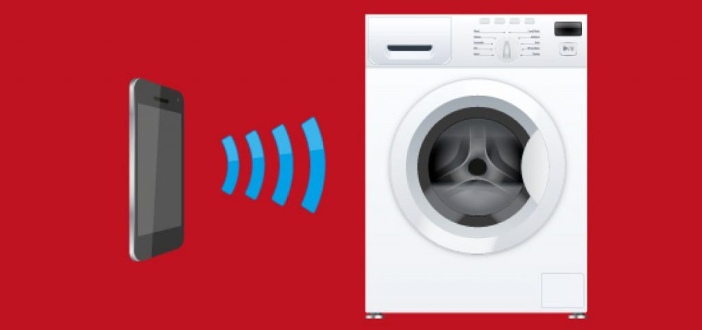 Image of a smartphone connecting wireless to a washing machine
