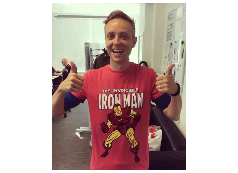 A Bunnyfoot consultant is pictured, dressed in an Iron man T-shirt, sporting a friendly smile and two thumbs up!